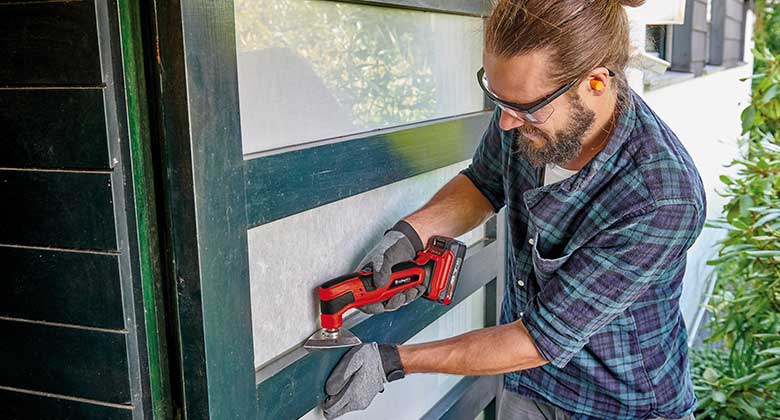 man working with a multifunctional tool