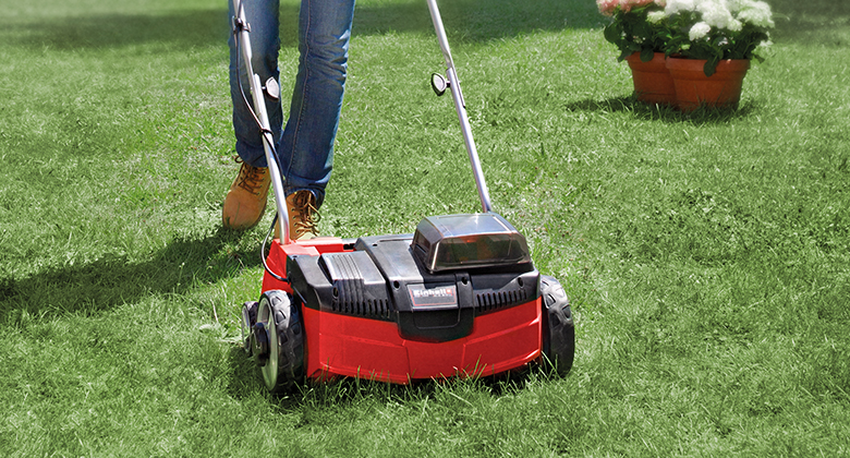 working with a scarifier in the garden